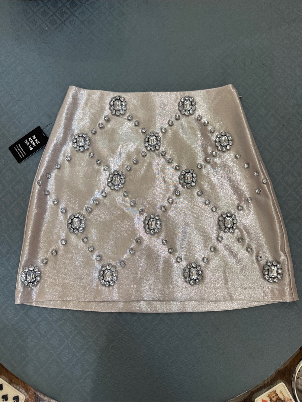Express Shimmering Blush Mini Skirt with Crystal Motifs